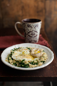 Garlicky Spinach, Millet and Eggs (via naturallyella.com)