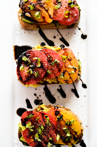 Avocado & Heirloom Tomato Toast with Balsamic Drizzle (via blissfulbasil.com)