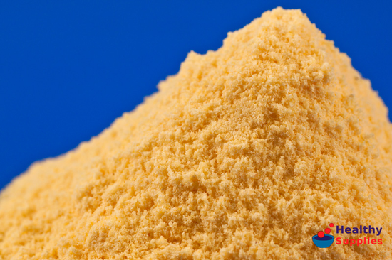 Moist, dense and crumbly corn meal.