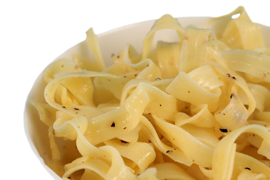 Cooked Tagliatelle served in un-refined olive oil and black pepper.